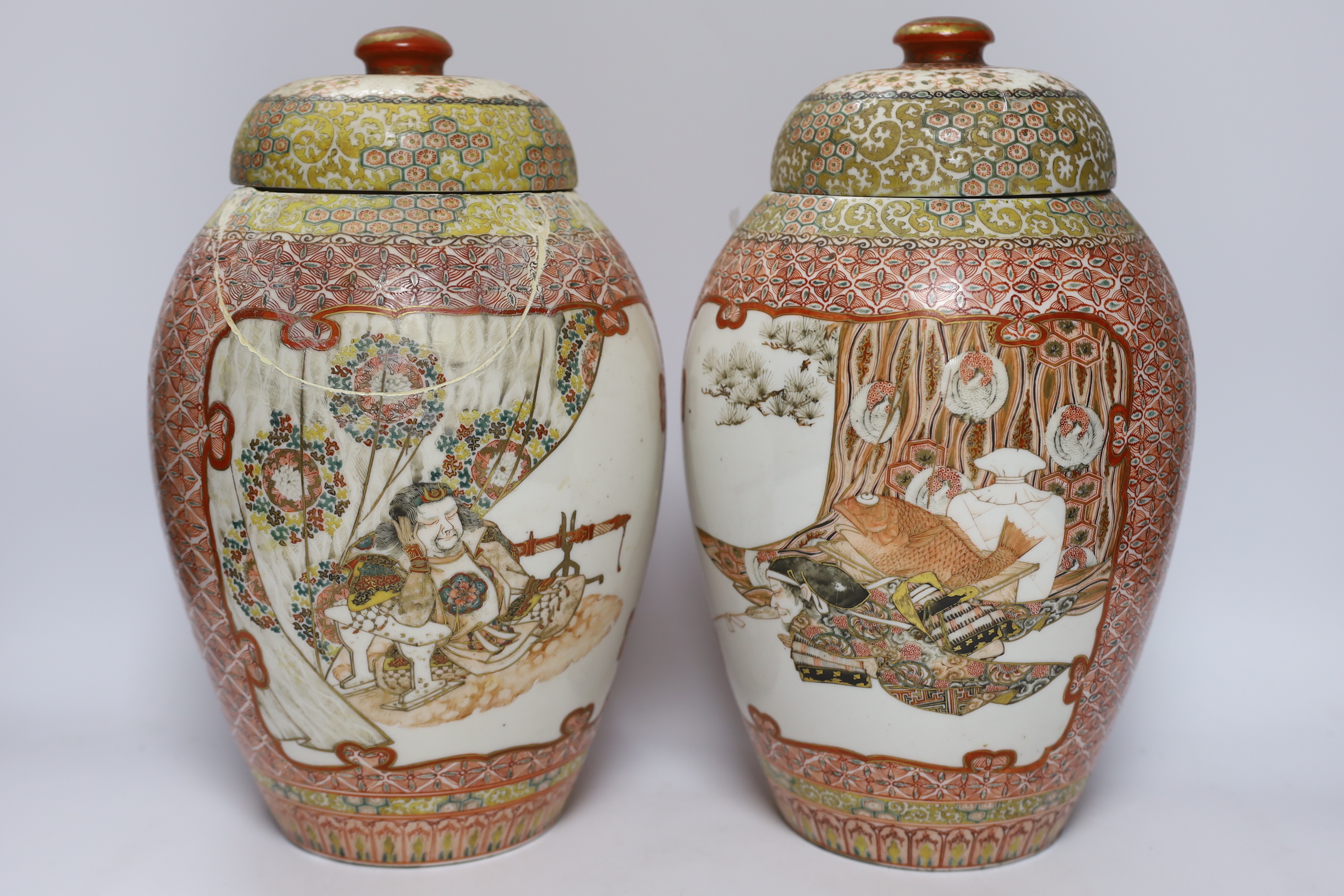 A pair of Japanese Meiji period vases and covers, 31cm (a.f.)